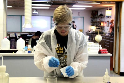 Student conducts experiment